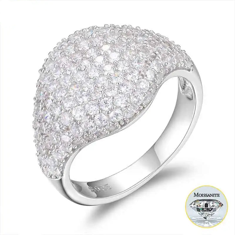 Silver ring with clear gemstones on a white background