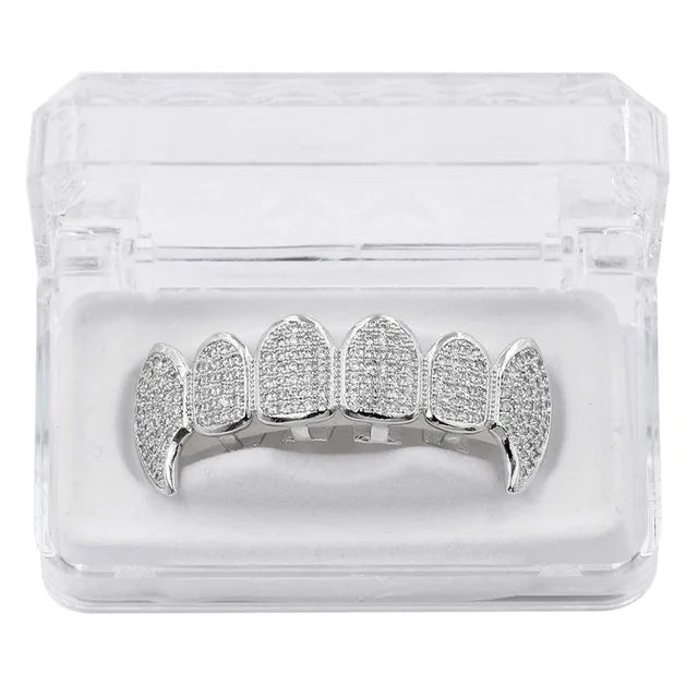 vampire Silver grillz in clear packaging